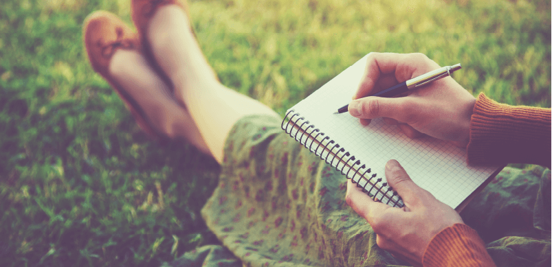 Woman Writing In New Diary