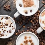 Table Full Of Filled Coffee Cups