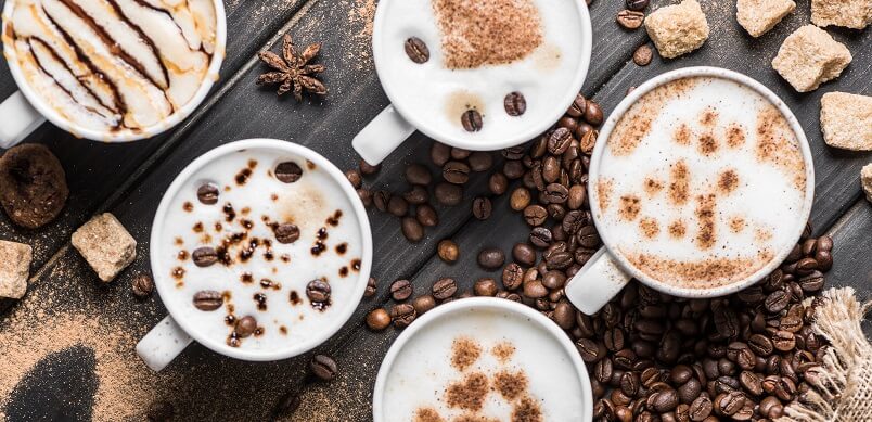 Table Full Of Filled Coffee Cups