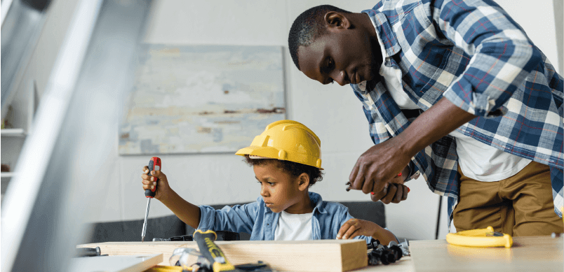 Man Repairing With Son