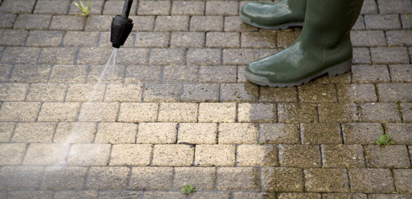 Pressure Washer Cleaning Patio