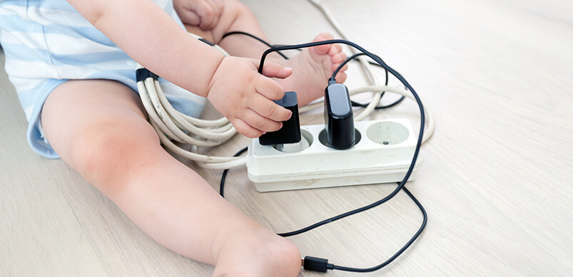 Child Using Plug Socket