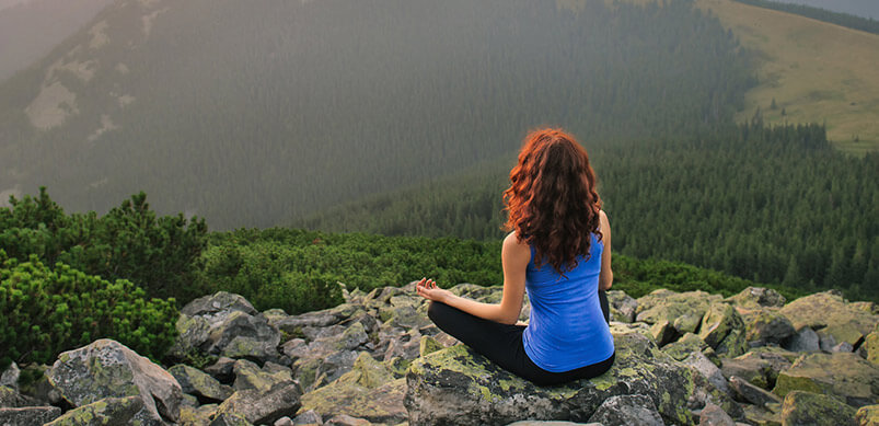 Woman Meditating in Nature