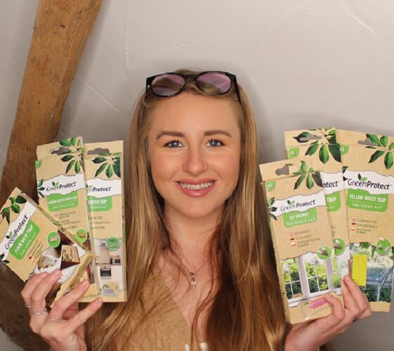 Amy Holding Green Protect Products