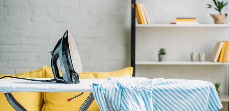 Ironing Board With Iron And Shirt