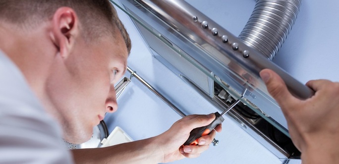 Man Fixing Cooker Hood