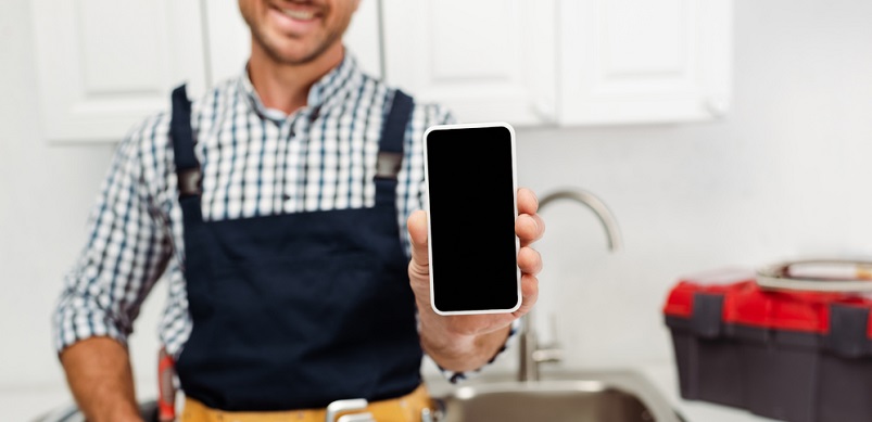 Man holding fixed phone