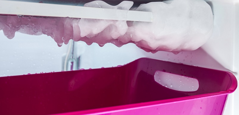 Freezer ice defrosting in bucket